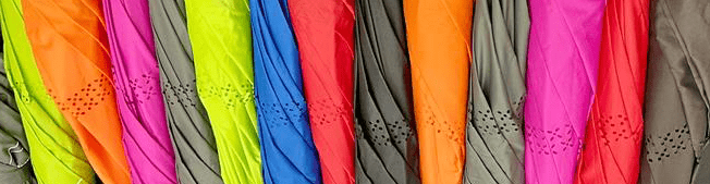 Line of umbrellas of various colors