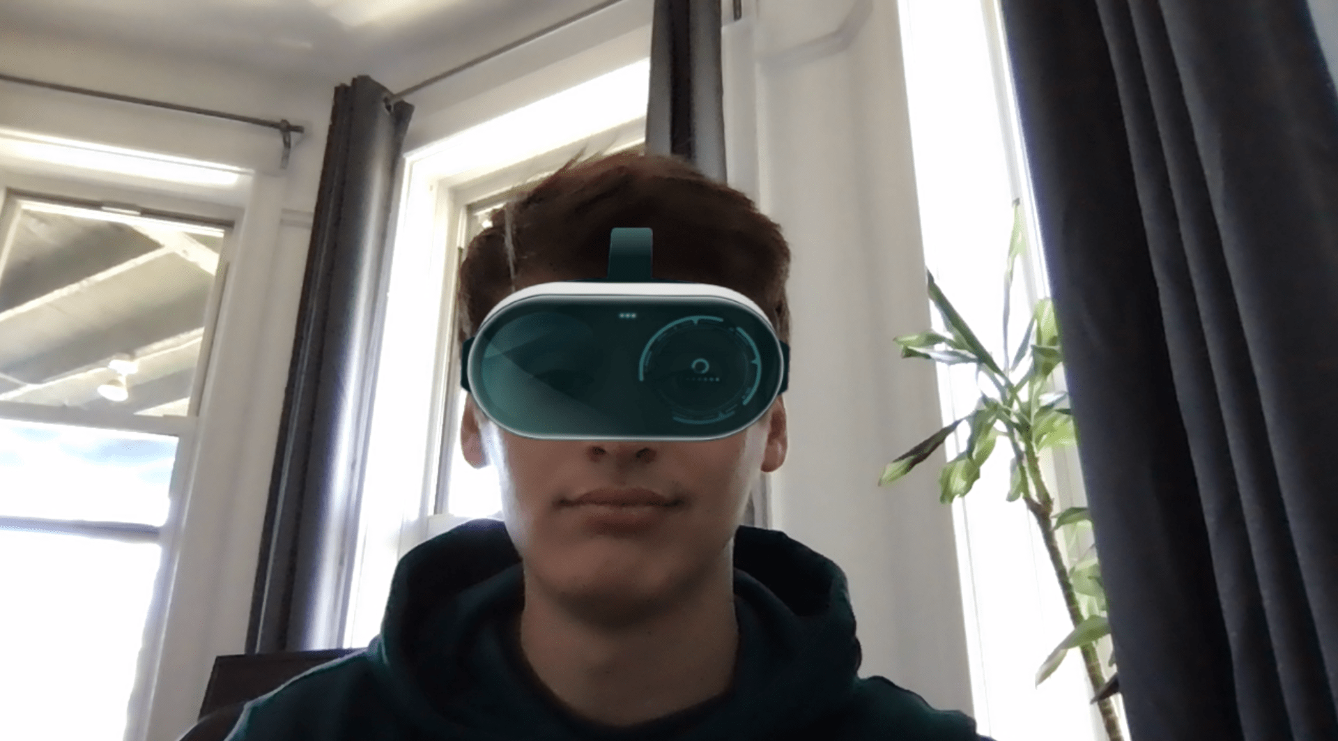 Dean wearing virtual virtual-reality headsets